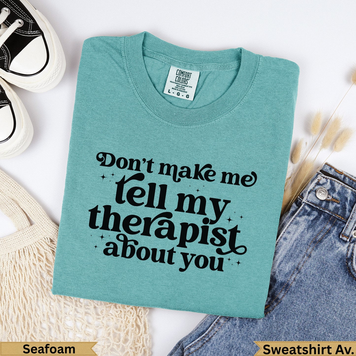 Seafoam t-shirt with black text "Don't make me tell my therapist about you."