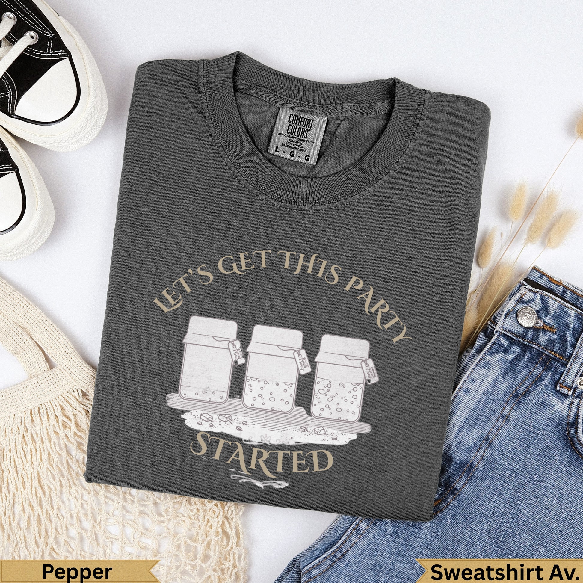 Dark gray Comfort Colors t-shirt with "Let's Get This Party Started" graphic.
