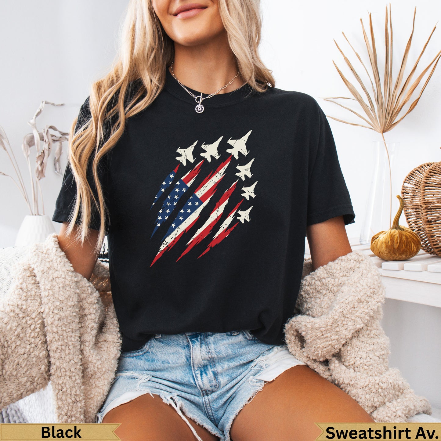 Black t-shirt with American flag and fighter jets graphic.
