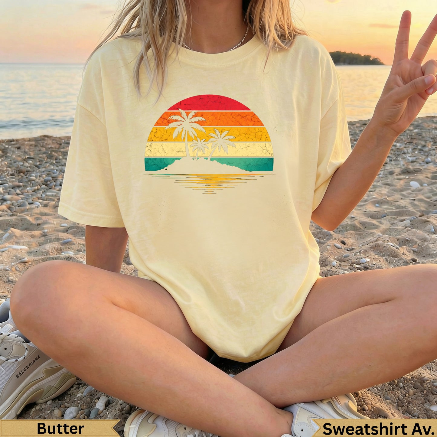 Yellow t-shirt with a retro sunset graphic featuring palm trees.