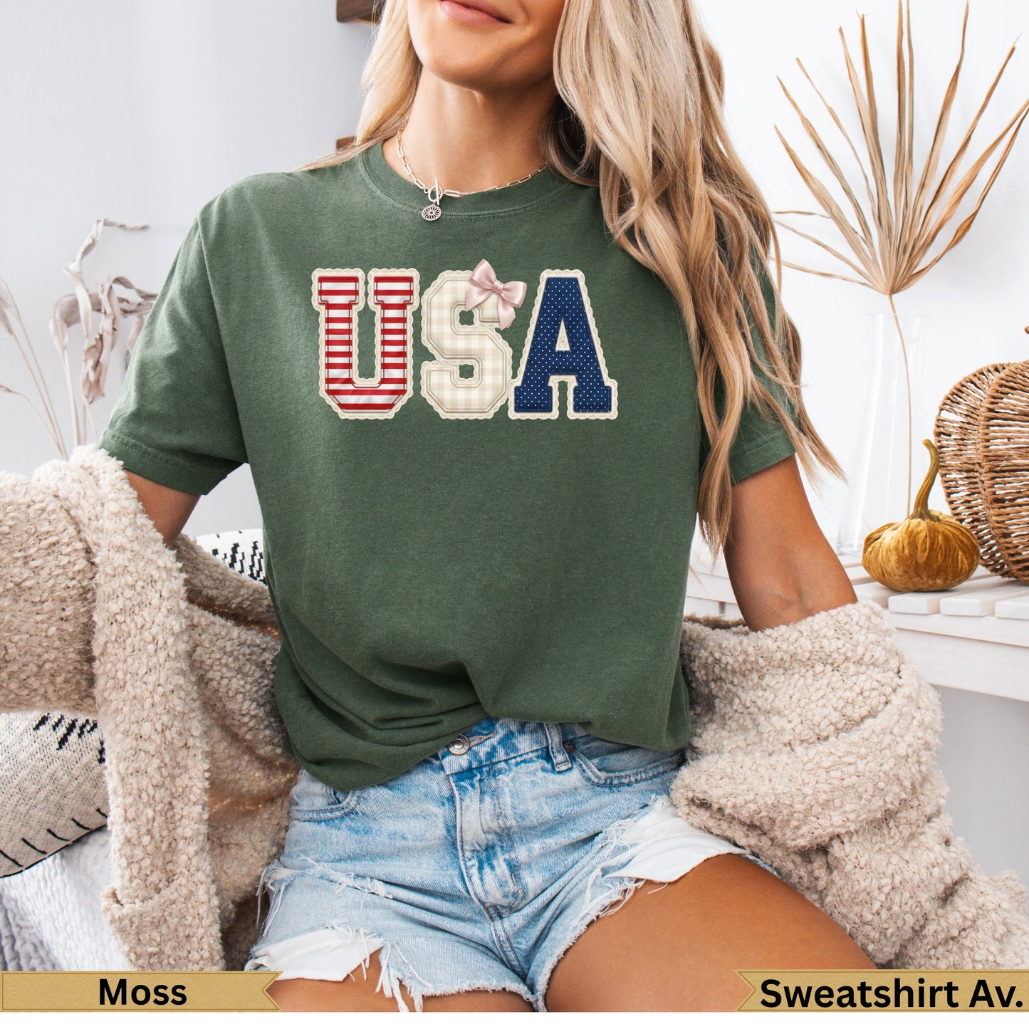 Green t-shirt with red, white, and blue "USA" graphic and plaid accents.