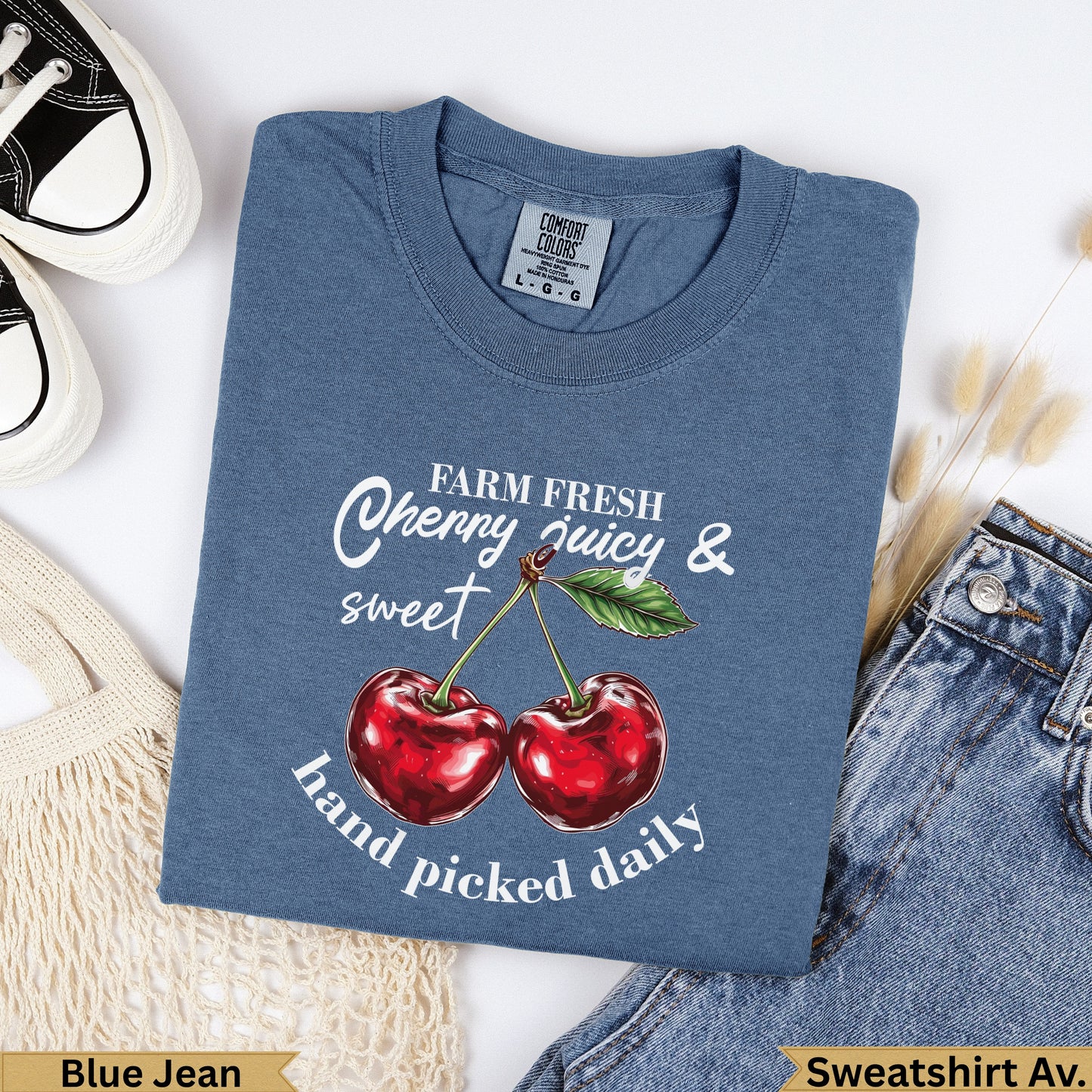 Blue Jean t-shirt with "Farm Fresh Cherry Juicy & Sweet Hand Picked Daily" text and graphic.