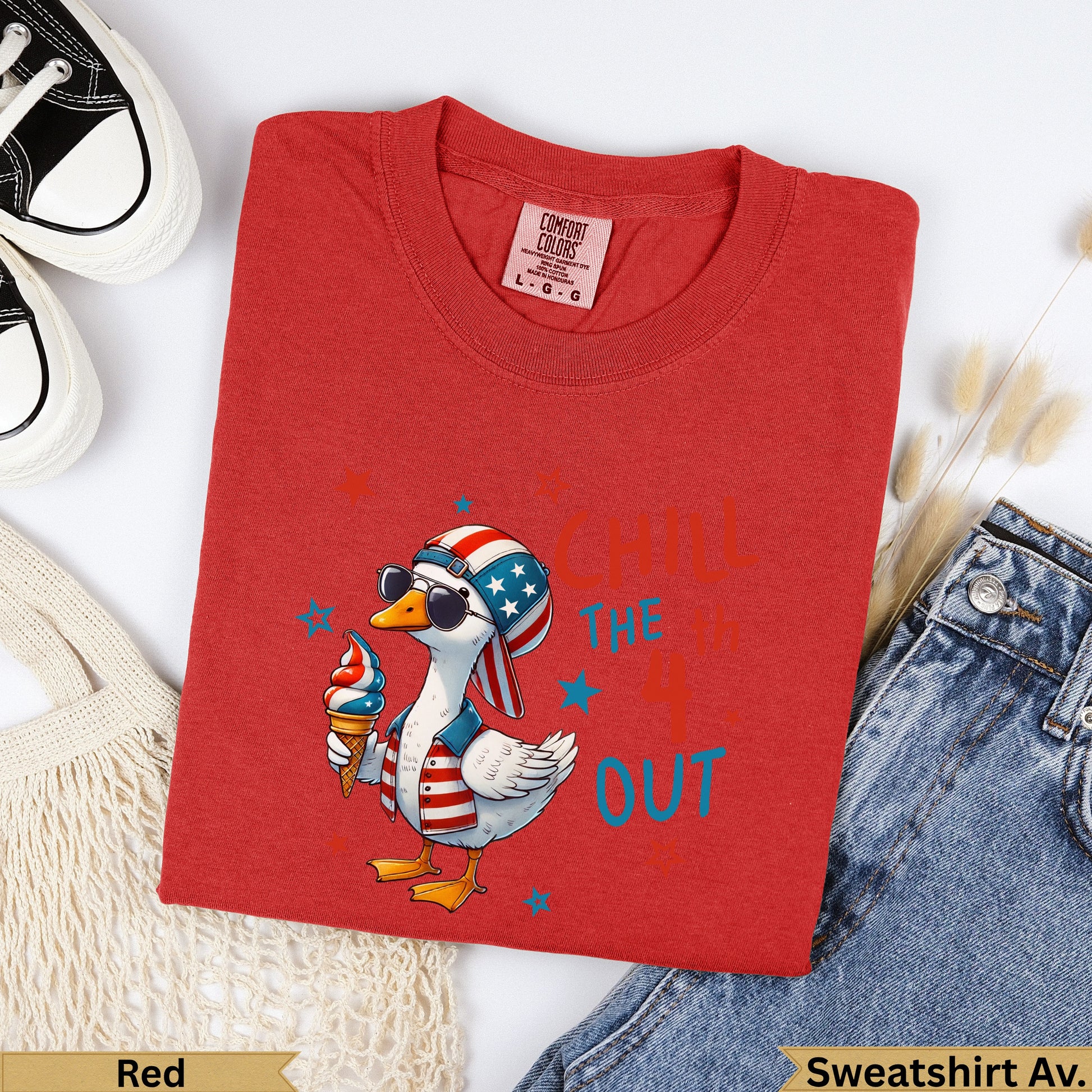 Red sweatshirt with a duck wearing sunglasses holding an ice cream cone.