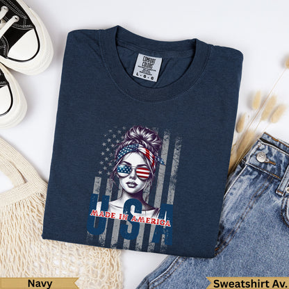 Navy Comfort Colors sweatshirt with "Made in America" graphic featuring a woman wearing American flag sunglasses.