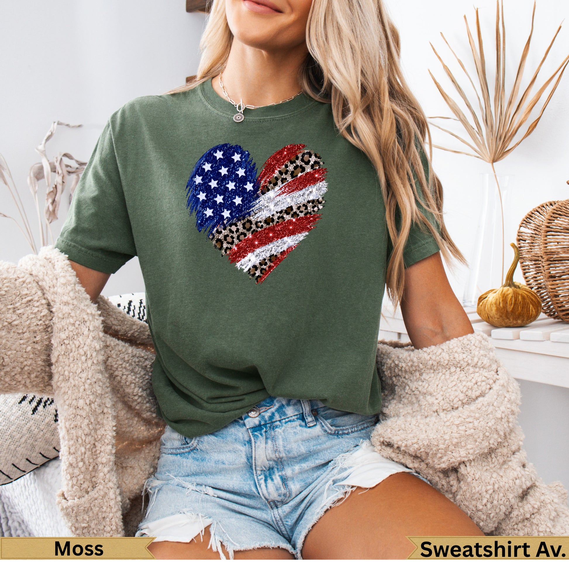 Green t-shirt with a glittery heart design of American flag and leopard print.