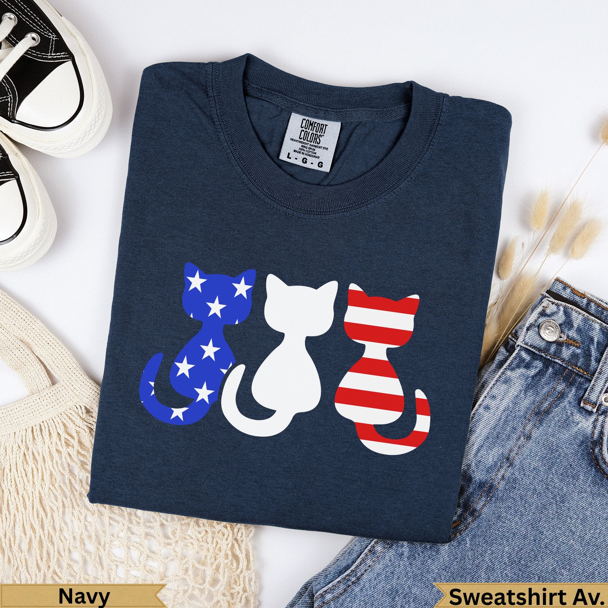 Navy sweatshirt with three cat outlines, two with American flag designs.