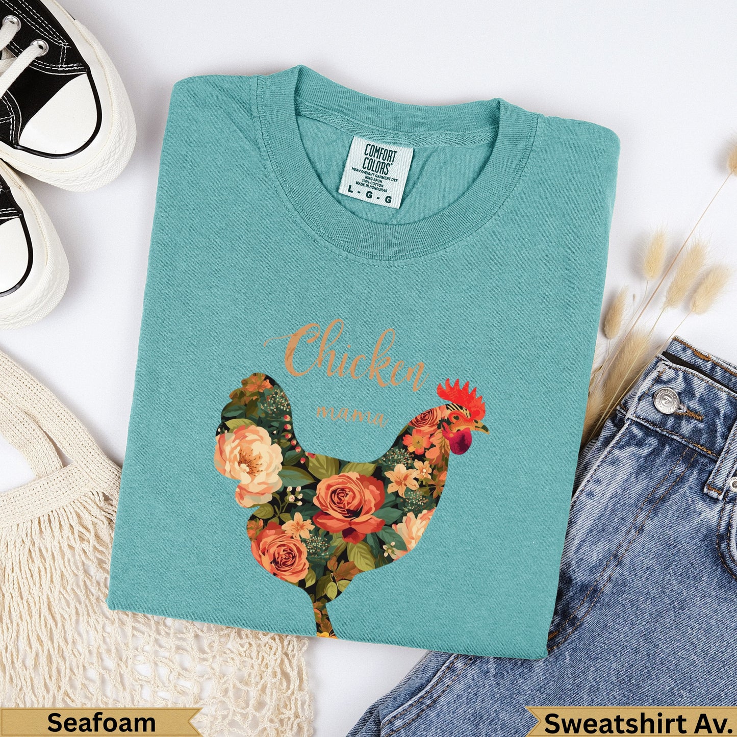 Teal Comfort Colors sweatshirt with floral chicken graphic and "Chicken" text.