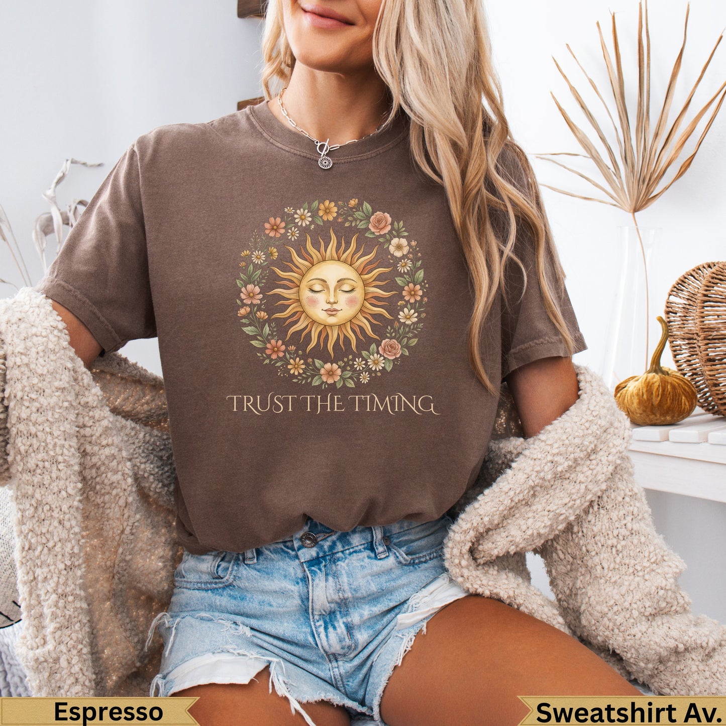 Brown t-shirt with sun graphic and text "TRUST THE TIMING".