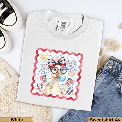 White Comfort Colors sweatshirt with patriotic duck graphic and red, white, blue fireworks.