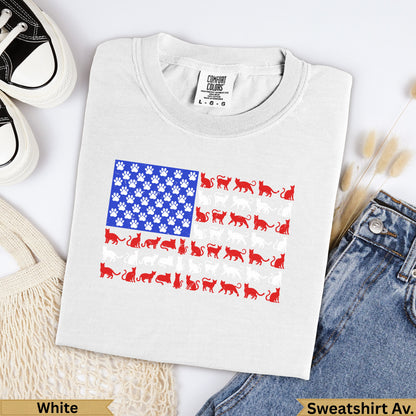 T-shirt with American flag design made of cat paw prints and cats.