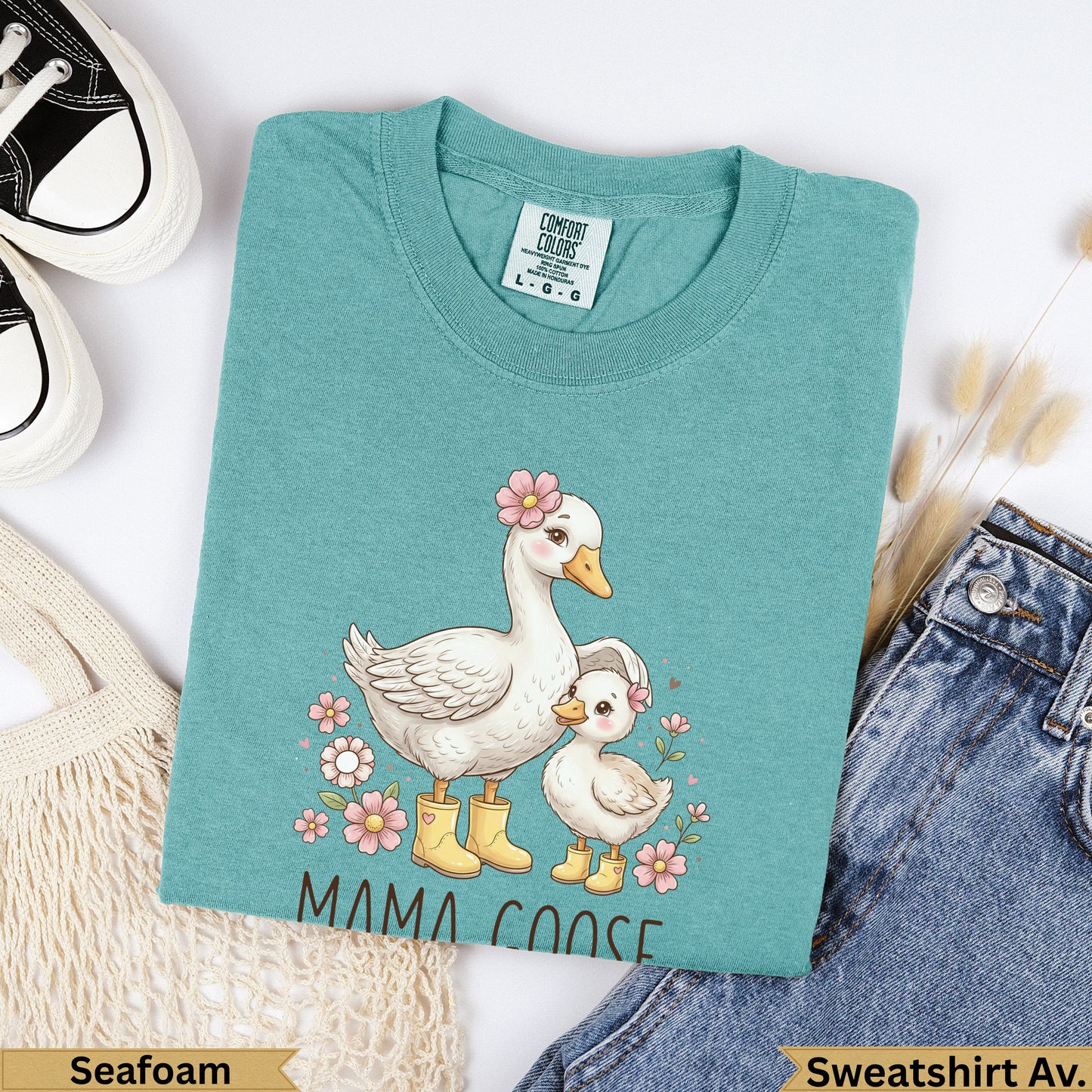 Teal t-shirt with "MAMA GOOSE" and goose illustration, Seafoam color.