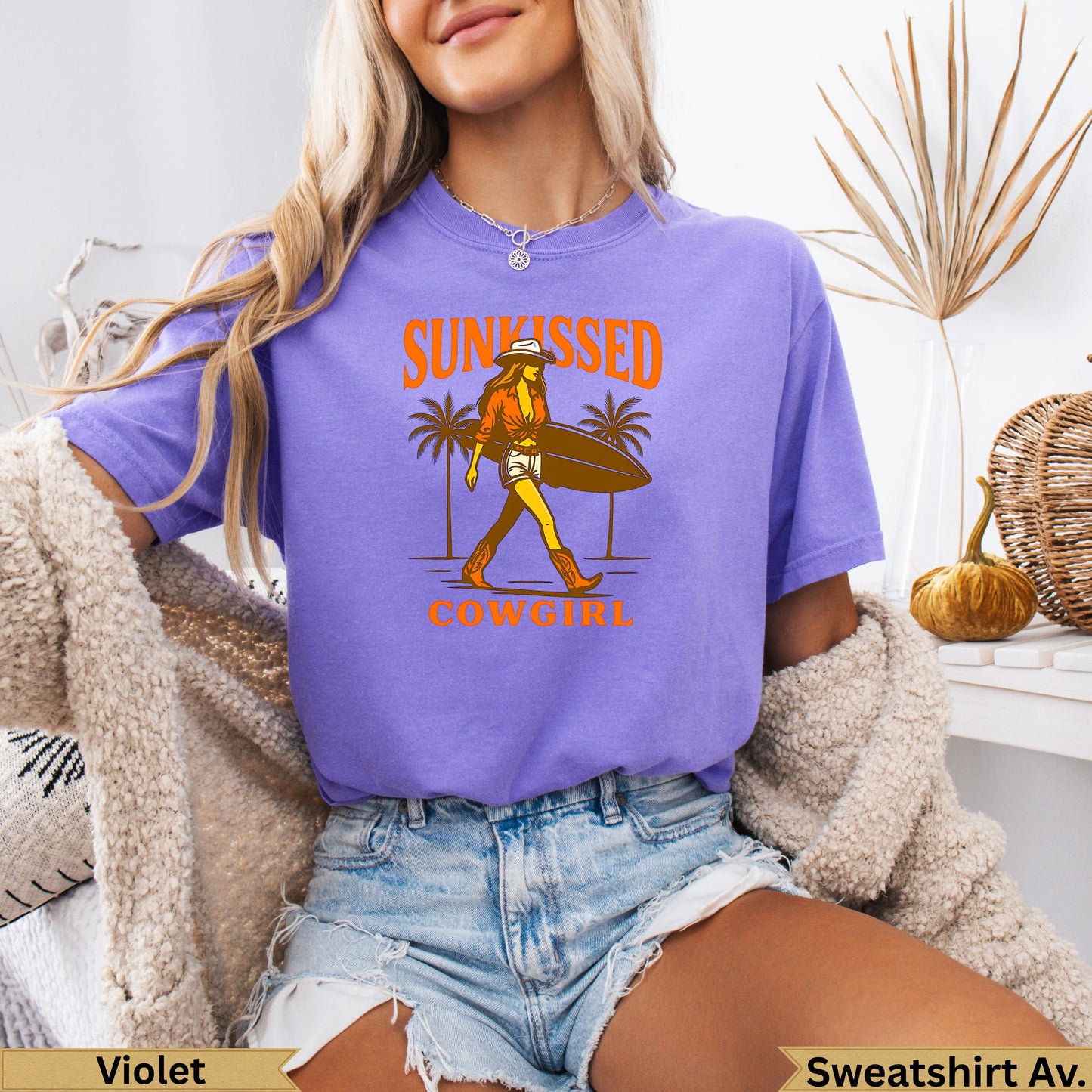 Purple t-shirt with "Sunkissed Cowgirl" text and palm trees graphic.