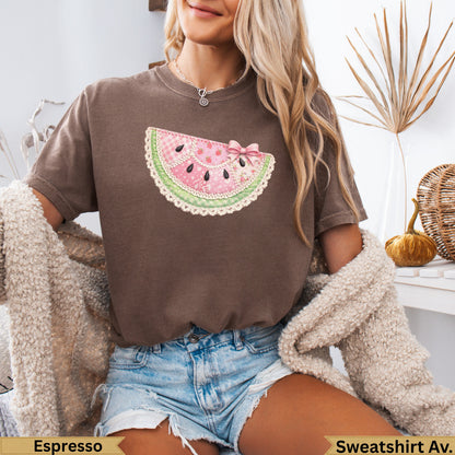 Brown sweatshirt featuring a pink and green watermelon slice applique.