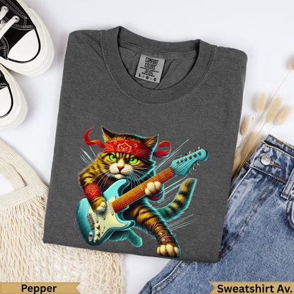 Graphic tee with a cat wearing a bandana and playing a blue electric guitar.