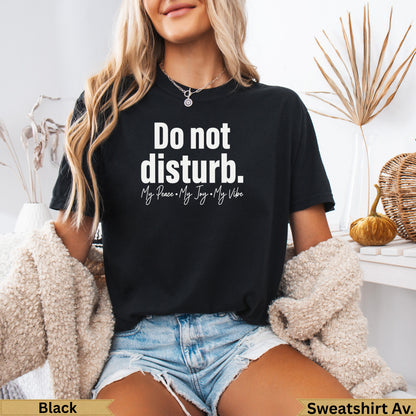Black crewneck sweatshirt with "Do not disturb. My Peace • My Joy • My Vibe" text.