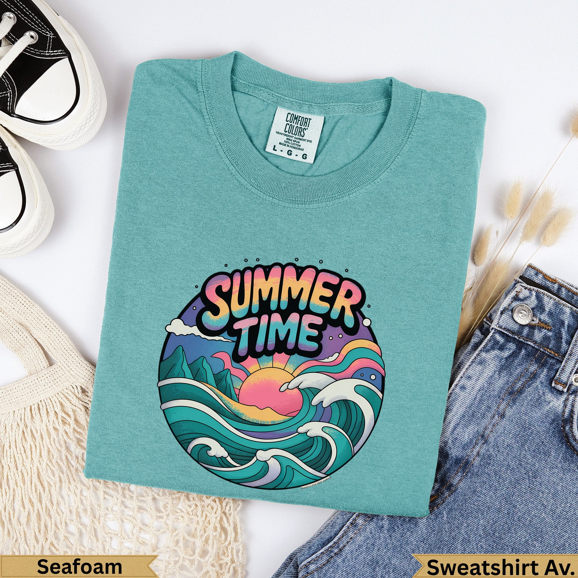 Teal t-shirt with "Summer Time" graphic of sun and waves, labeled "Seafoam".
