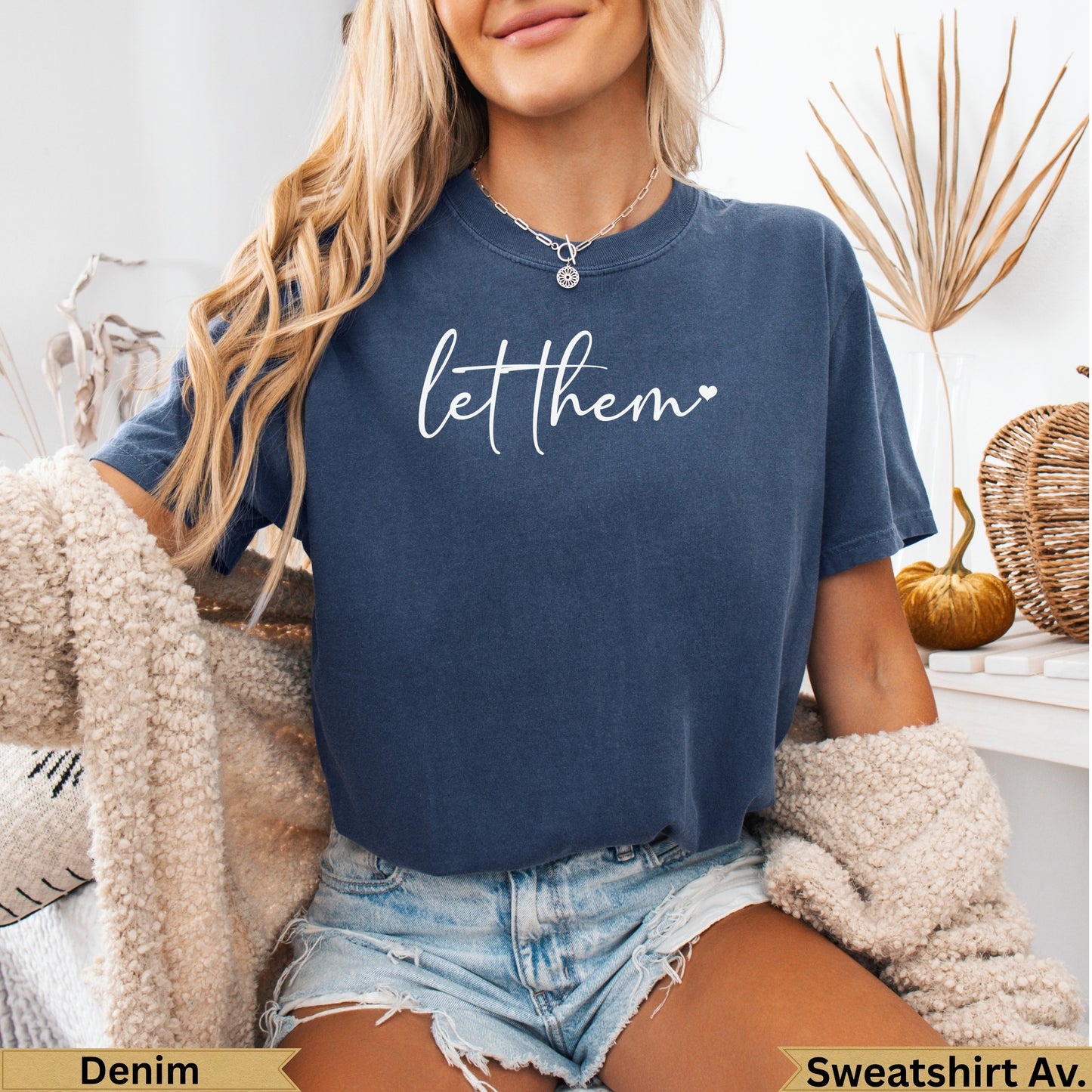 Dark blue t-shirt with "let them" handwritten text.