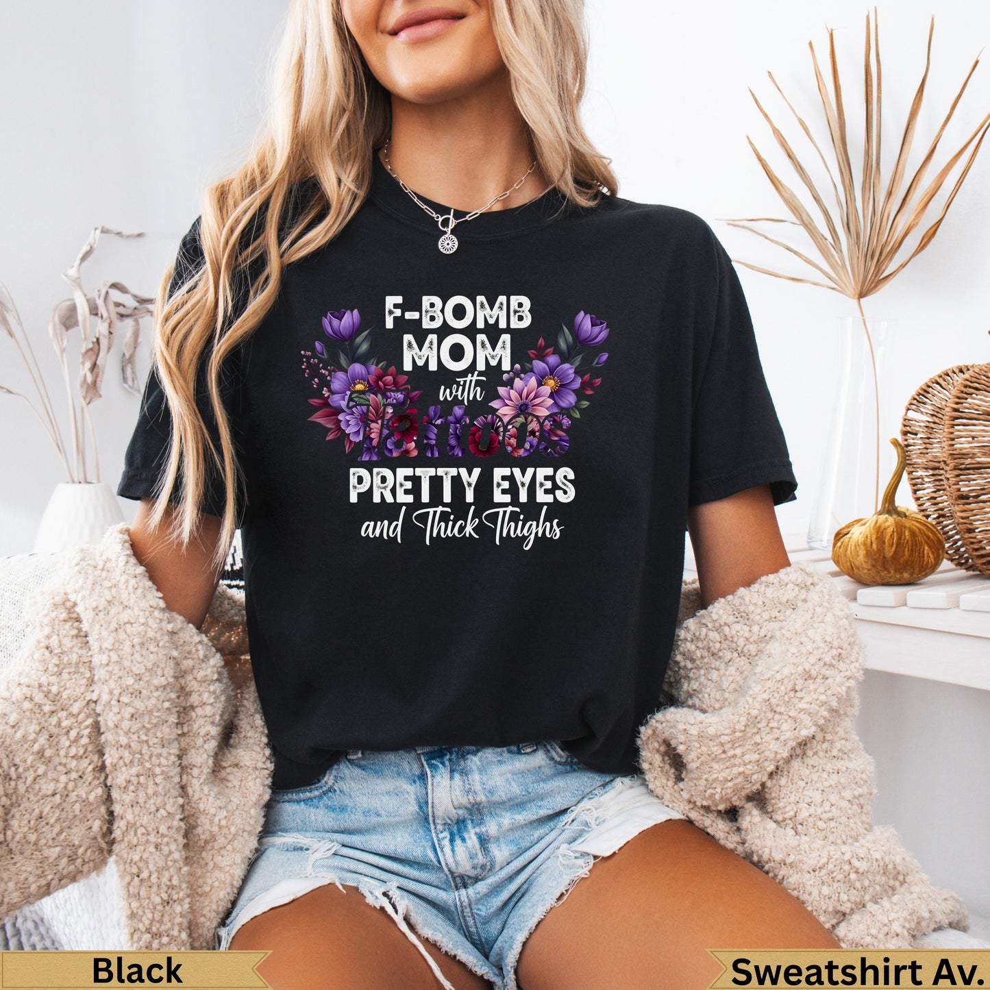Black t-shirt with "F-BOMB MOM" and floral graphic.