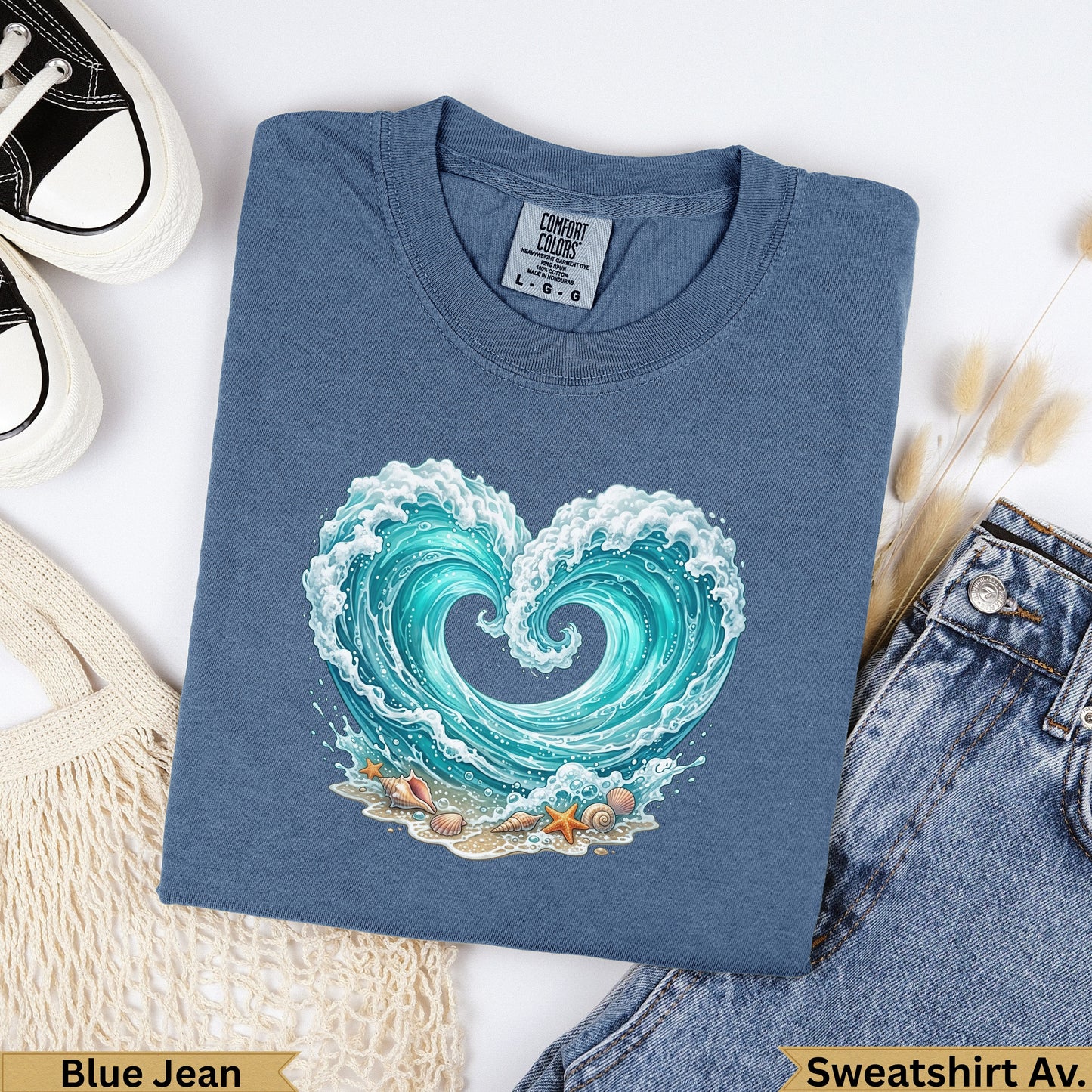 Blue Jean t-shirt with a stylized ocean wave forming a heart shape.