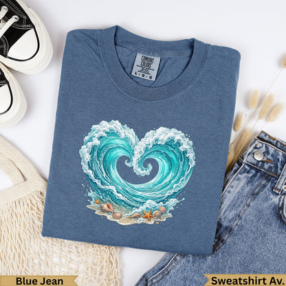 Blue Jean t-shirt with a stylized ocean wave forming a heart shape.