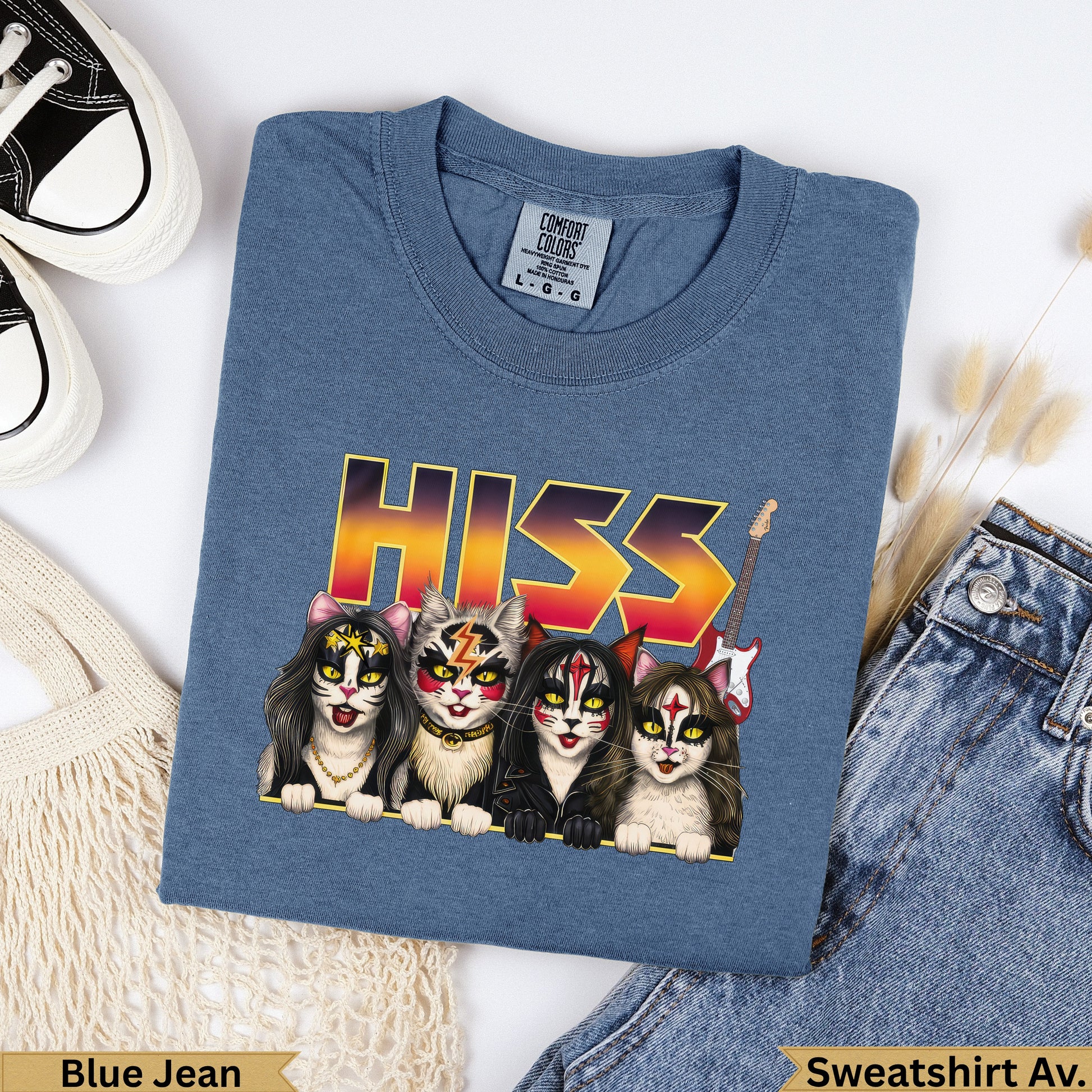 Four cats with KISS-inspired makeup and a guitar, text reads "HISS".