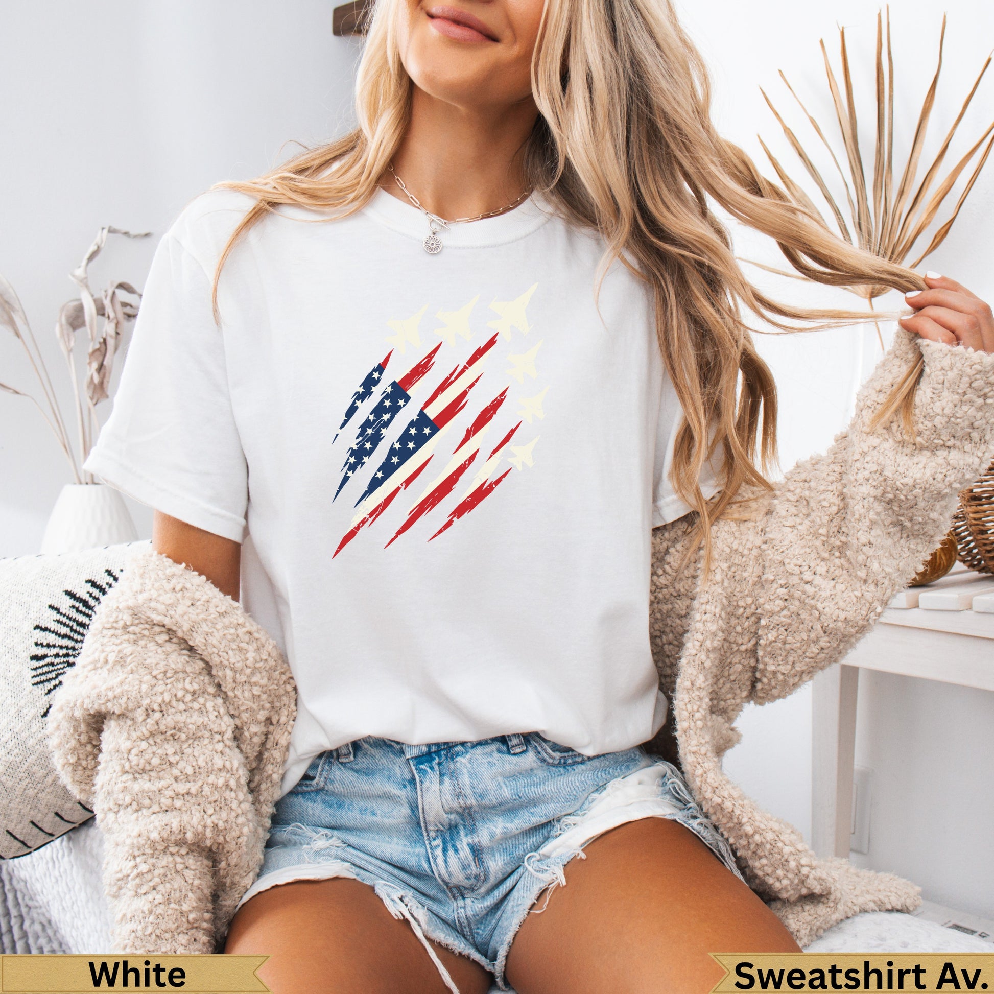 White t-shirt with American flag design and flying planes.