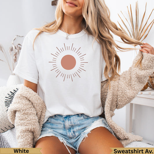 White t-shirt with sunburst graphic and text "Sweatshirt Av."