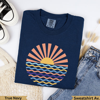 Navy t-shirt with a sunburst over wavy lines design.