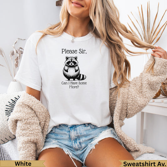 White t-shirt with a raccoon graphic and text "Please Sir, Can I Have Some More?".