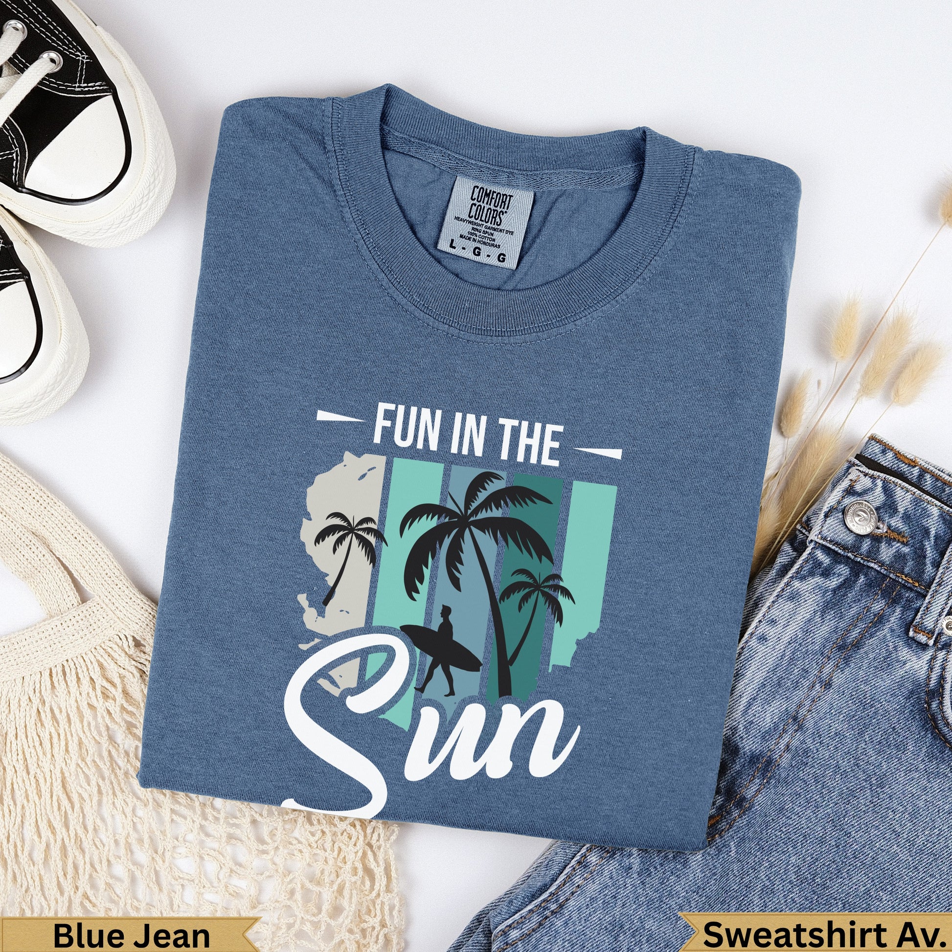 Blue Jean sweatshirt with "FUN IN THE Sun" graphic featuring palm trees and a surfboard.