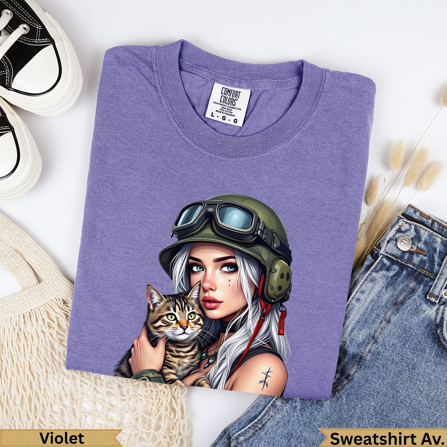 Purple sweatshirt with military-themed woman and cat graphic.