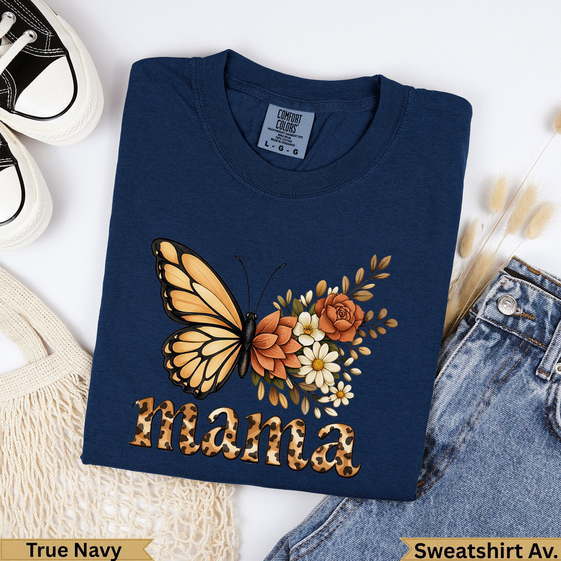 Navy t-shirt with "Mama" text and a butterfly with floral accents.