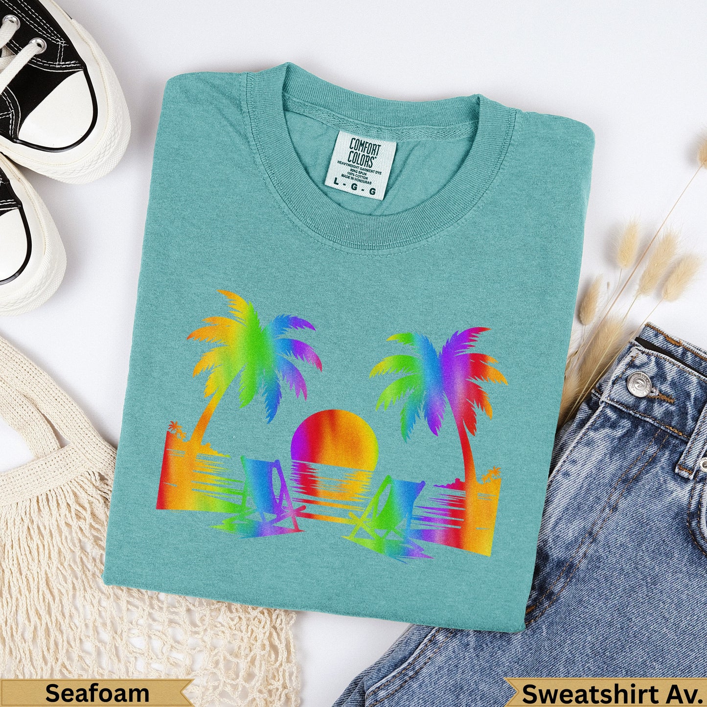 Teal Comfort Colors sweatshirt with rainbow palm trees, sun, and water graphic.