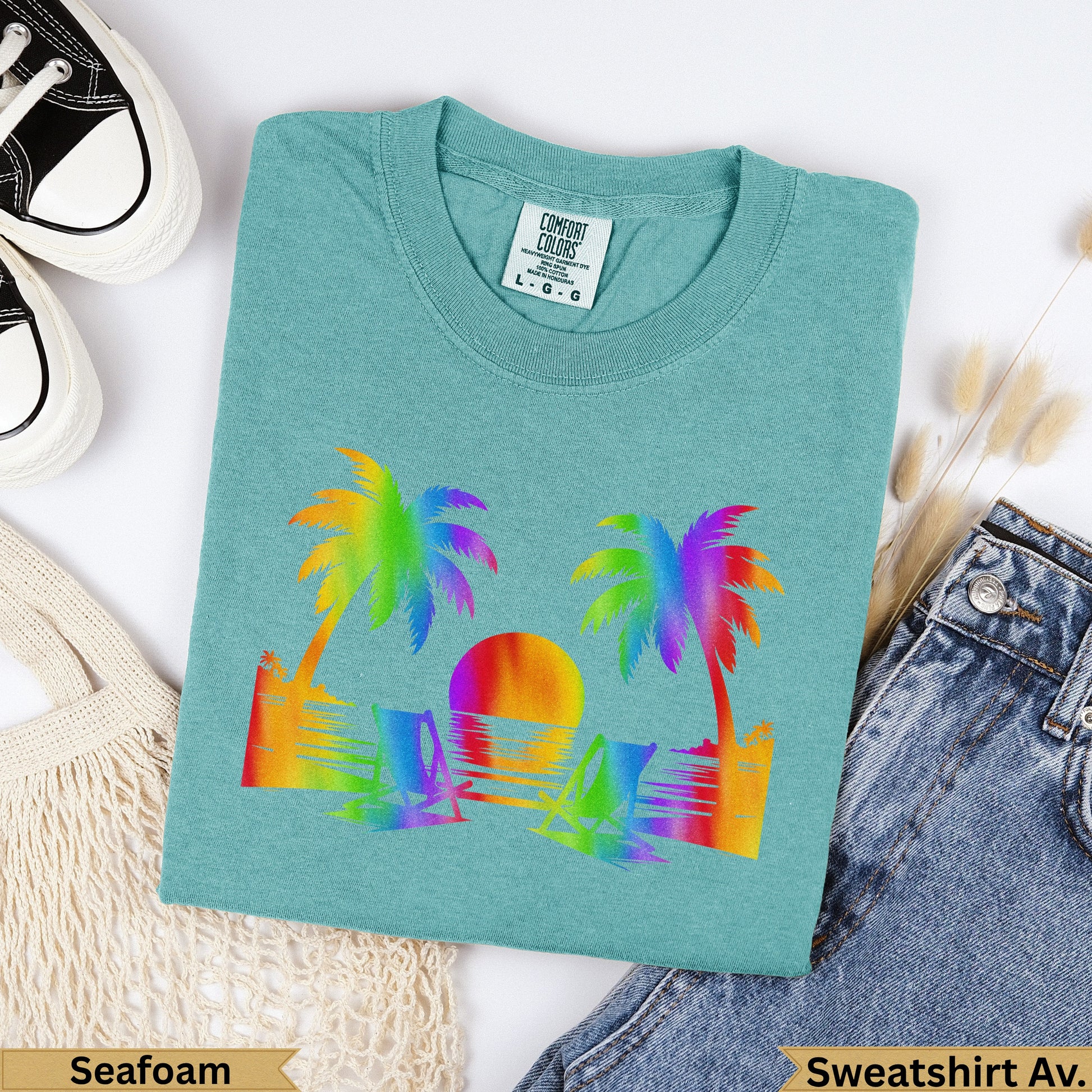 Teal Comfort Colors sweatshirt with rainbow palm trees, sun, and water graphic.