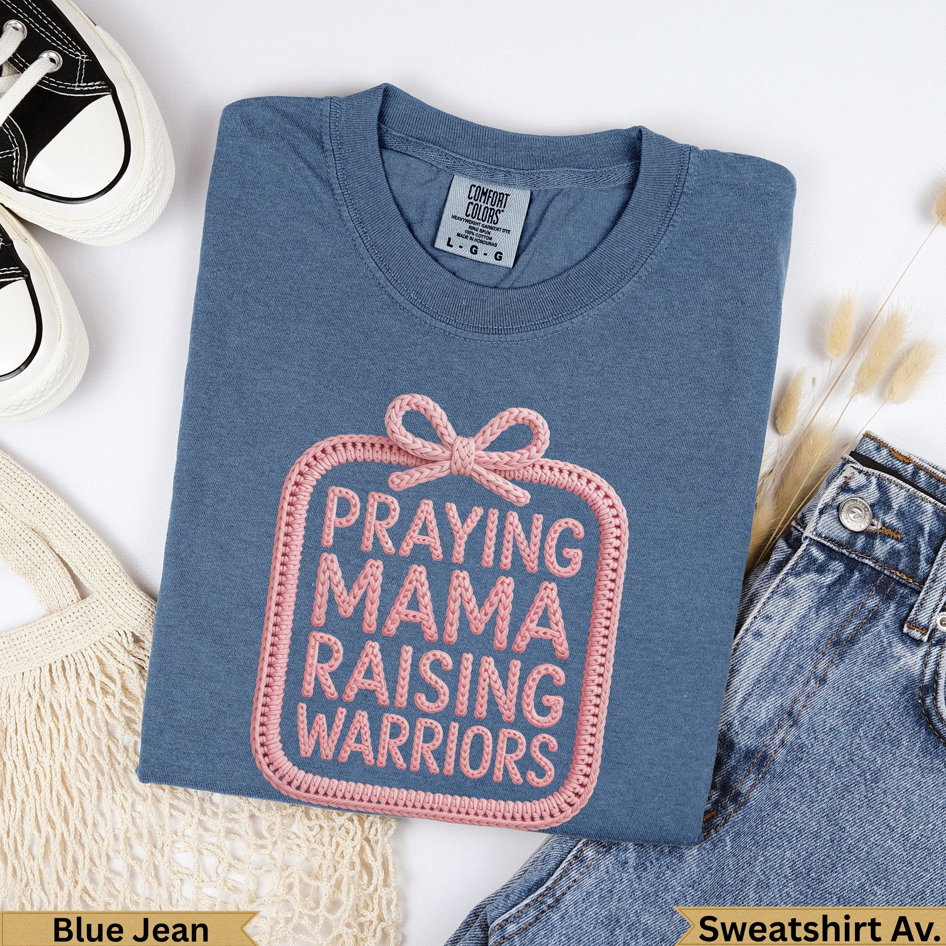 Blue Jean Comfort Colors t-shirt with "PRAYING MAMA RAISING WARRIORS" text.