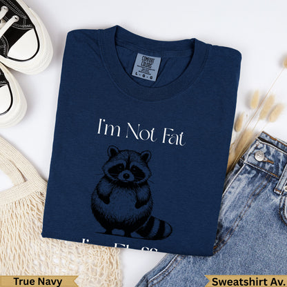 Navy sweatshirt with raccoon graphic and "I'm Not Fat" text.