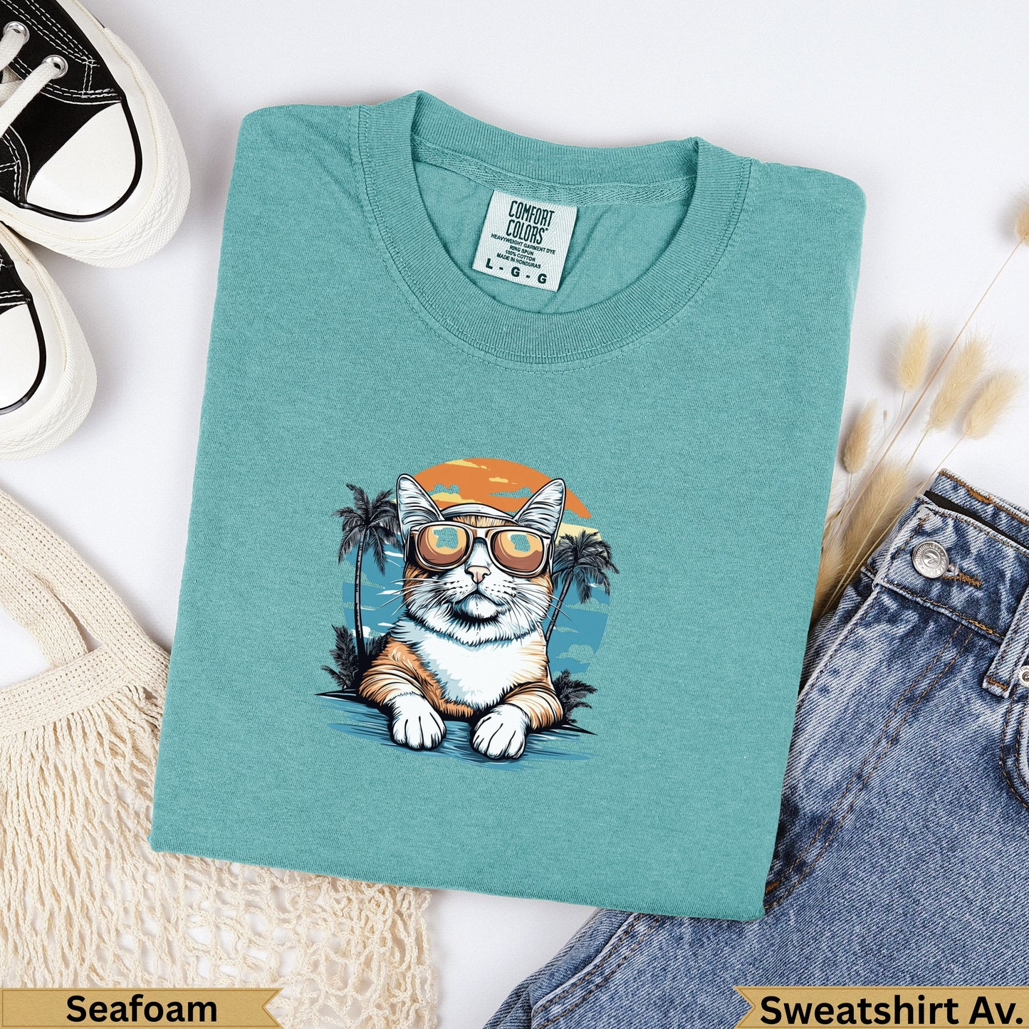 Teal Comfort Colors sweatshirt with a cat wearing sunglasses and palm trees.