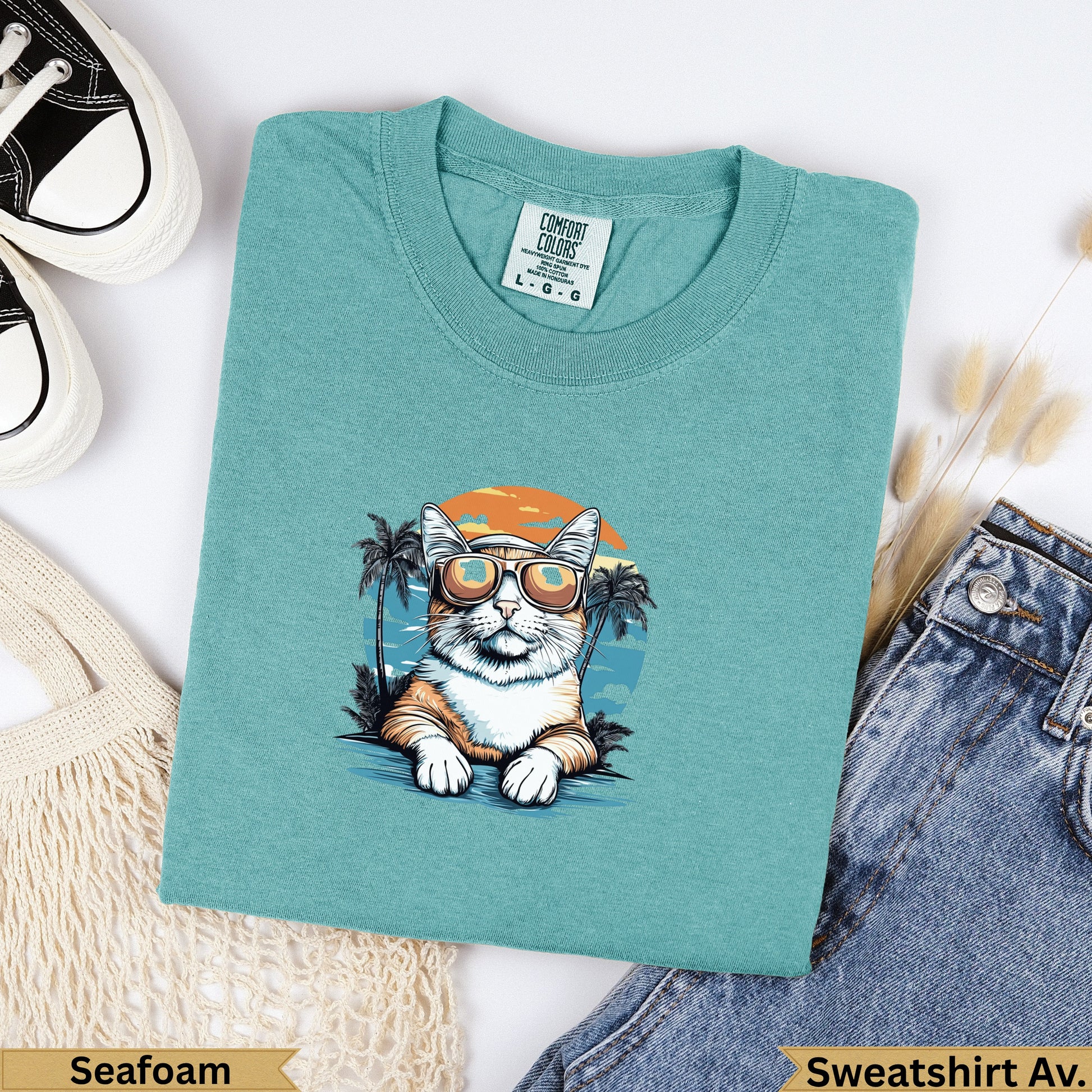 Teal Comfort Colors sweatshirt with a cat wearing sunglasses and palm trees.