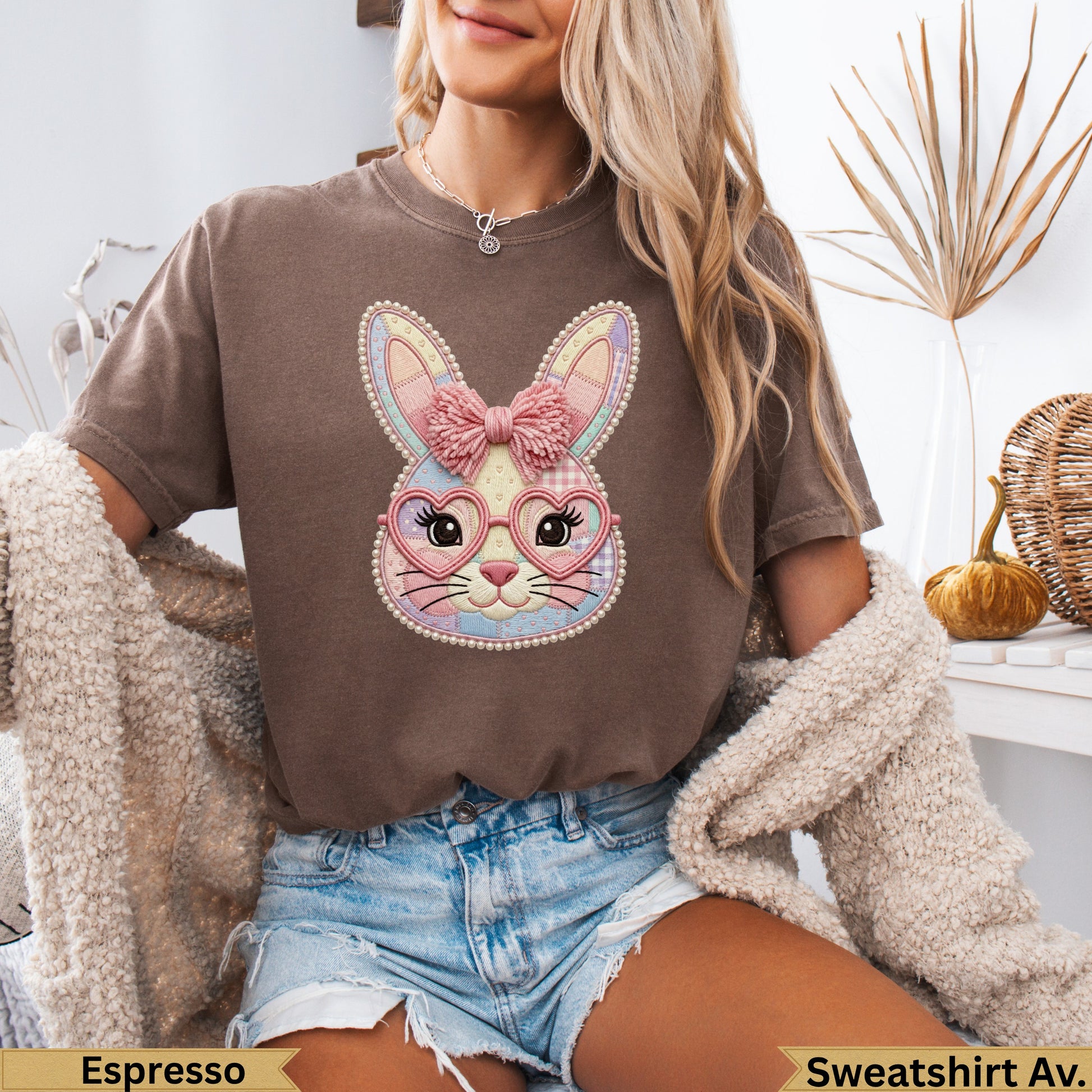 Brown t-shirt with a pastel plaid bunny wearing heart-shaped glasses.