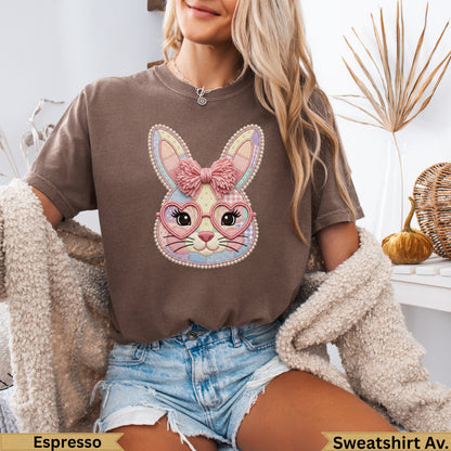 Brown t-shirt with a pastel plaid bunny wearing heart-shaped glasses.