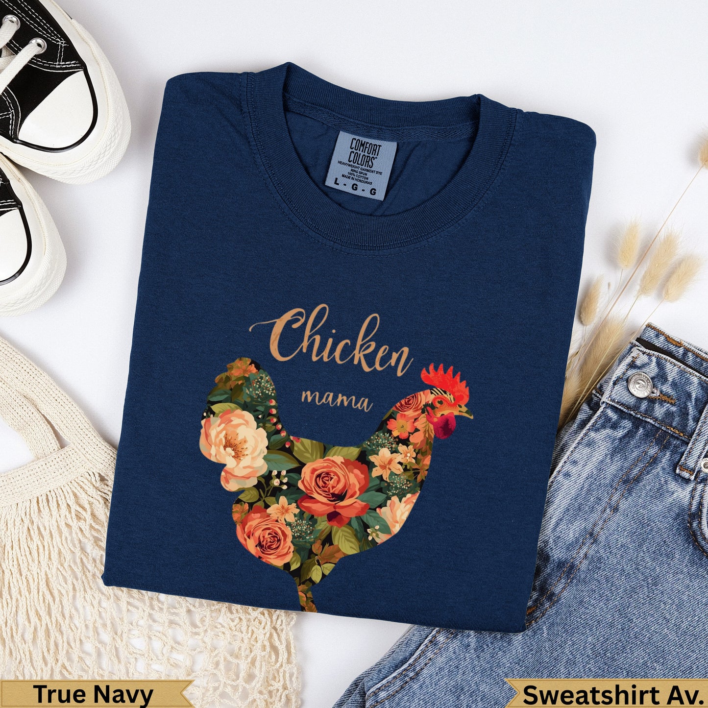 Navy sweatshirt with "Chicken mama" text and a floral chicken design.