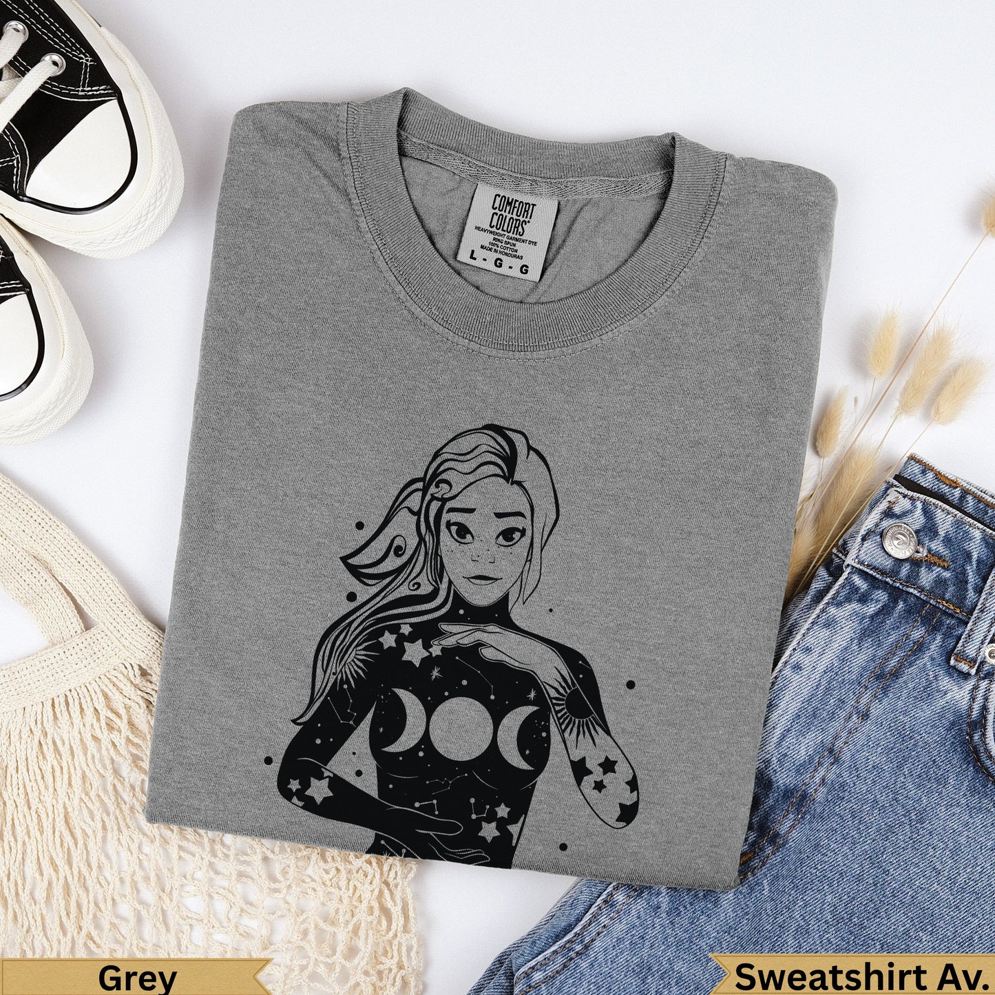 Grey Comfort Colors sweatshirt with celestial woman graphic.