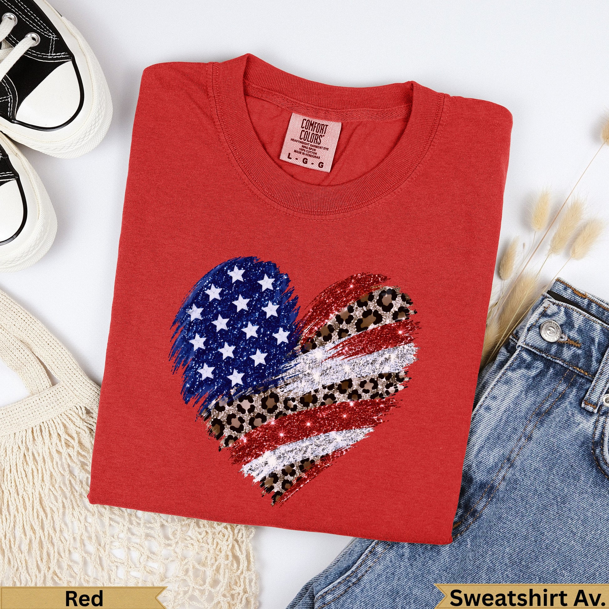 Red t-shirt with distressed American flag heart graphic.