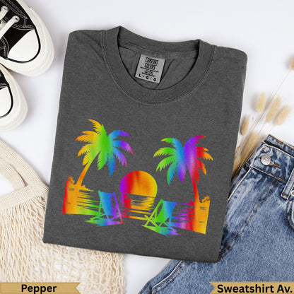 Dark gray t-shirt with rainbow palm trees and beach chairs graphic.