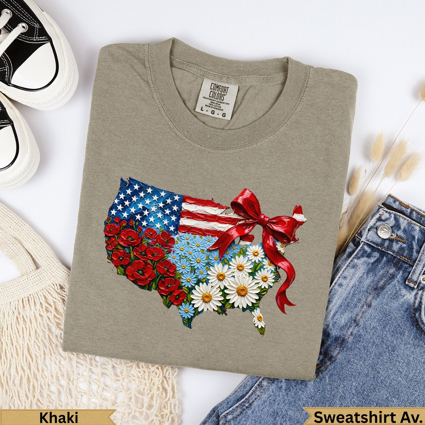 T-shirt featuring a USA flag map design with flowers and a red bow.