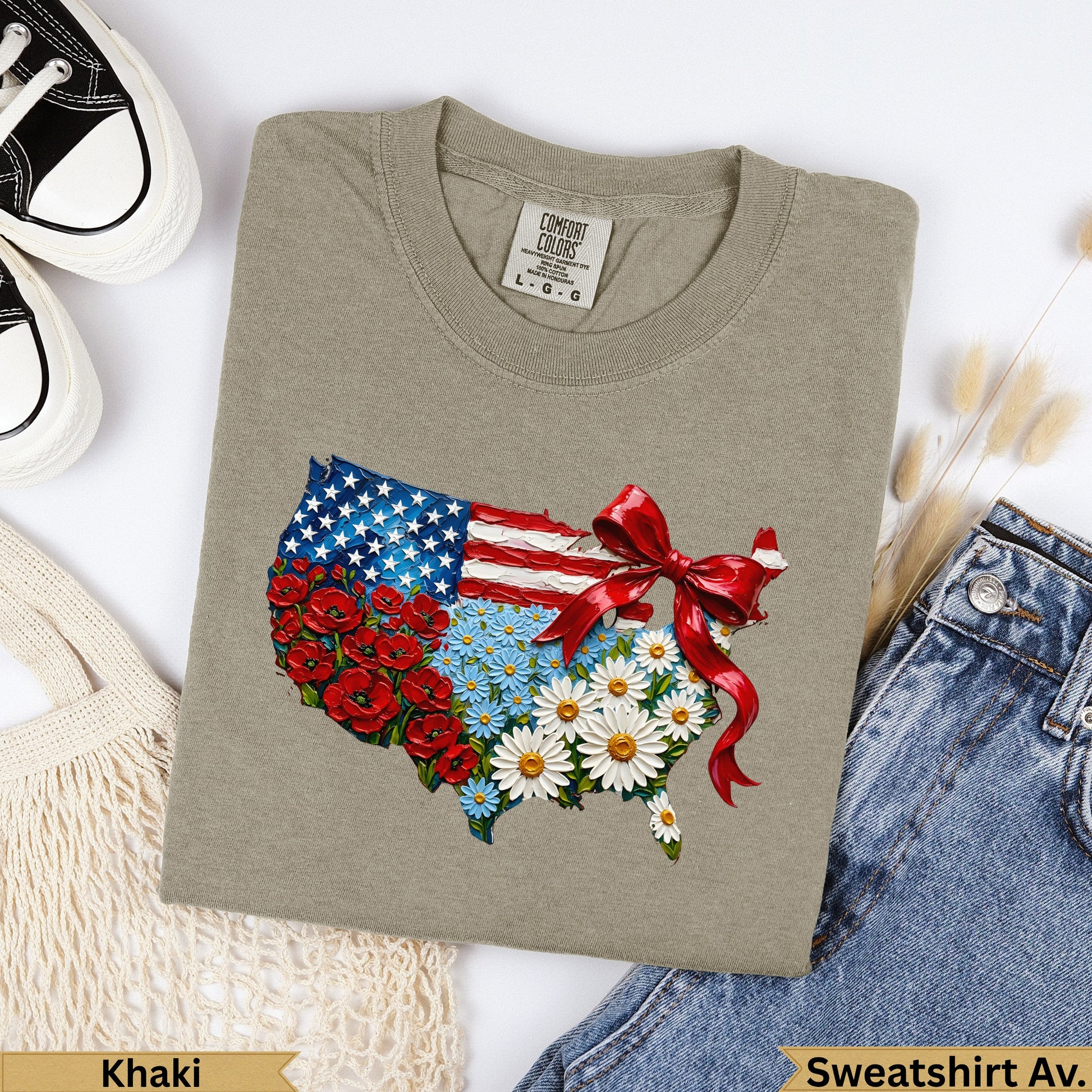 T-shirt featuring a USA flag map design with flowers and a red bow.