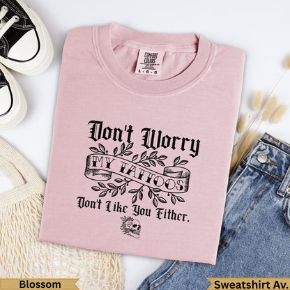 Blossom Comfort Colors t-shirt with "Don't Worry My Tattoos Don't Like You Either" text.