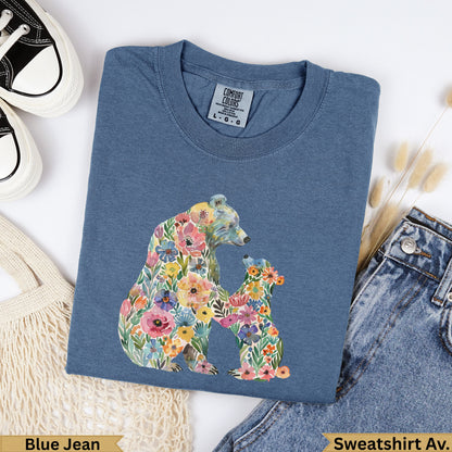 Blue sweatshirt with a colorful floral bear and cub design.