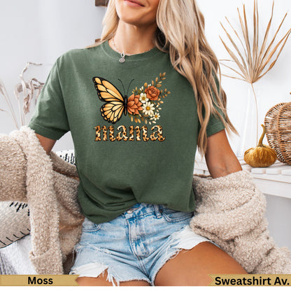 Green t-shirt with "Mama" in floral print and butterfly design.