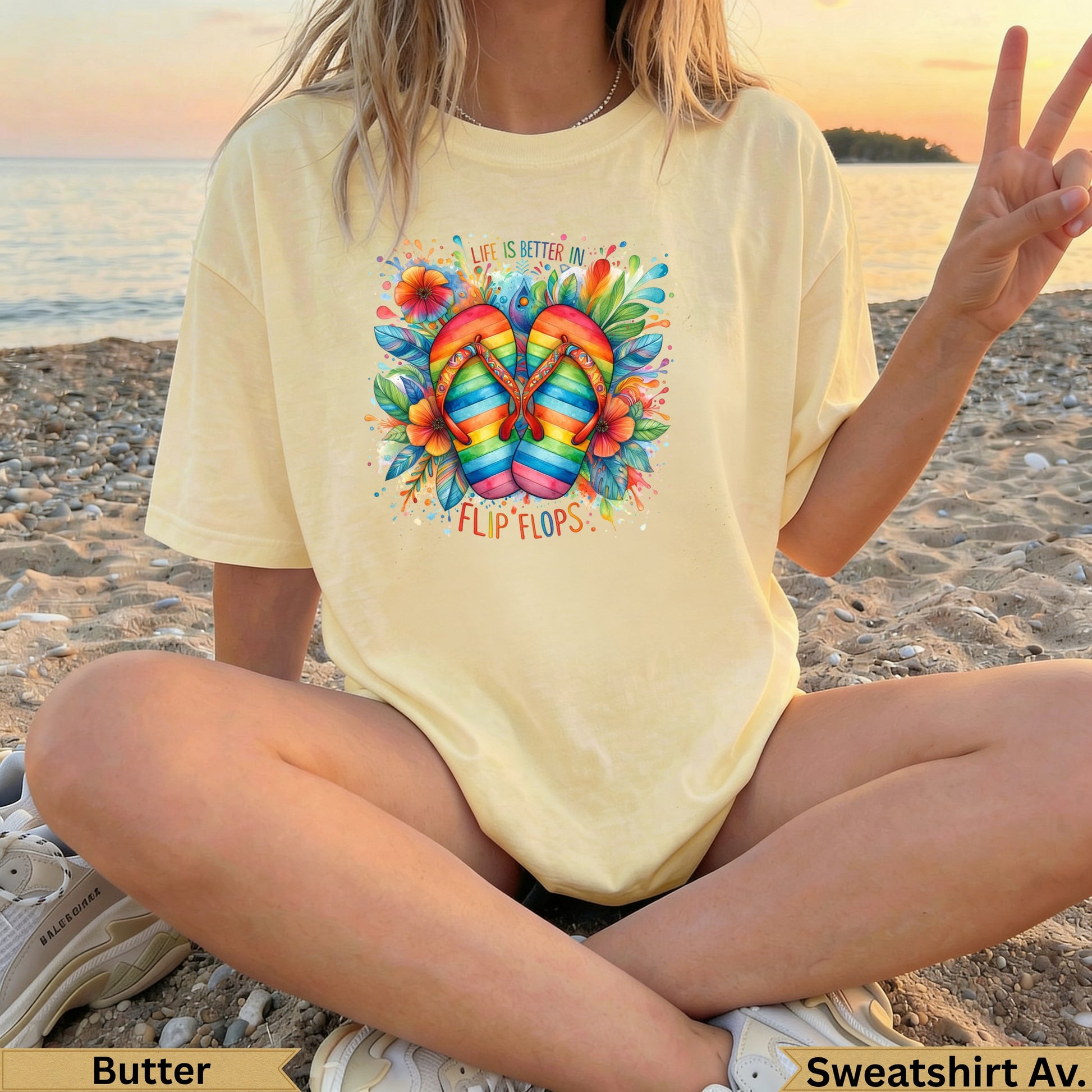 Yellow t-shirt with rainbow flip flops and floral watercolor graphic.